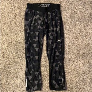 Nike dri-fit triangle print running capris.
